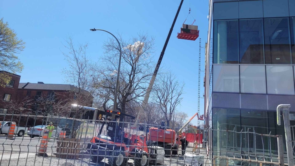 Moving services in Montreal with a crane truck